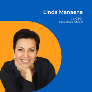 Image of a woman with short dark hair with her head resting on her hand smiling at the camera. Background is orange.