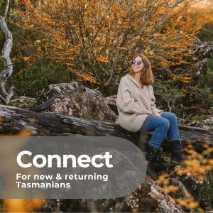 Connect promotional tile has a photo of a red haired woman in casual clothes sitting on a log with a tree with orange foliage as a background.