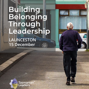 Image of a man walking up an urban laneway, back to the audience