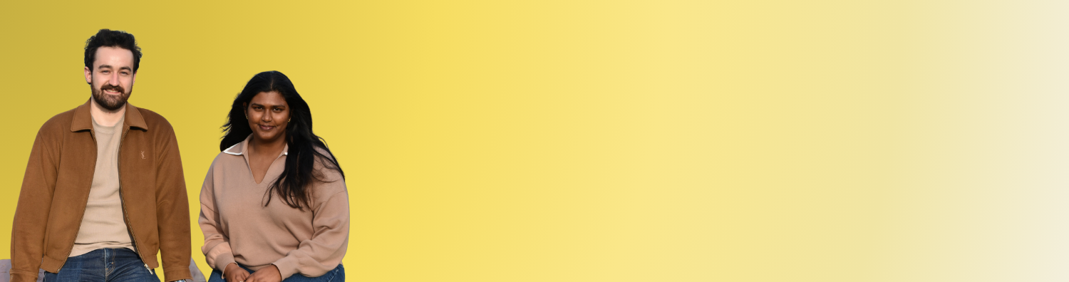 image of a man and a women seated facing front, yellow gradient coloured plain background